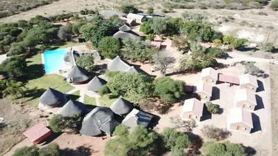 an overhead view of a home with a group of houses at Lapa Moyo Safari's in Linton