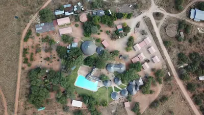 an overhead view of a park with buildings and trees at Lapa Moyo Safari's in Linton