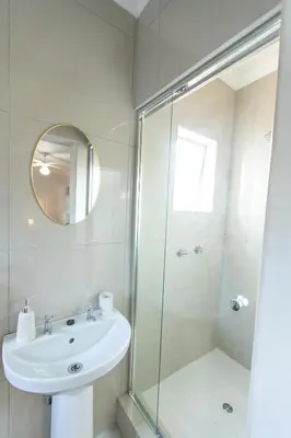a bathroom with a sink and a shower at 28 Schalk drive in Polokwane
