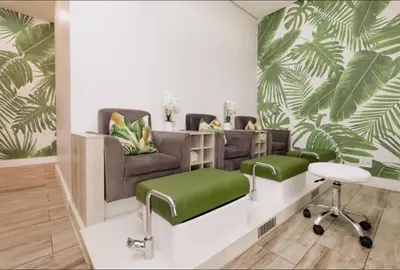 a waiting room with a couch and a chair at The Blyde blue lagoon in Pretoria