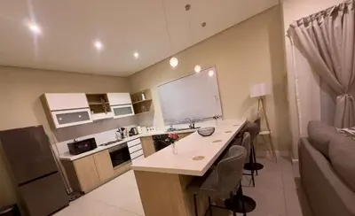 a kitchen with a sink and a counter in a room at Guestnest in Mokopane