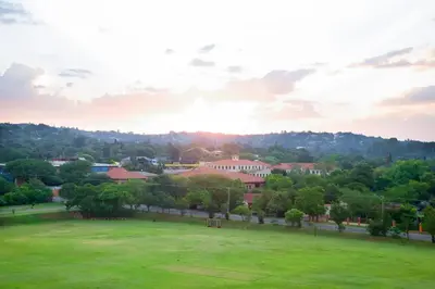 a view of a campus with a field and trees at Stay Menlyn - Luxe Apartment 617 in Pretoria