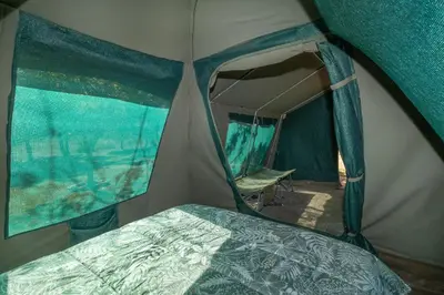 an overhead view of a tent with a bed in it at Die BosKamp - Hartbeespoort Dam in Hartbeespoort