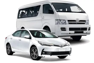 two white vans parked next to a white car at Hotels Near OR Tambo Airport Booked Easy in Johannesburg