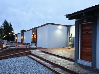 a house with a front yard with a door at Beds Inn Midrand in Midrand
