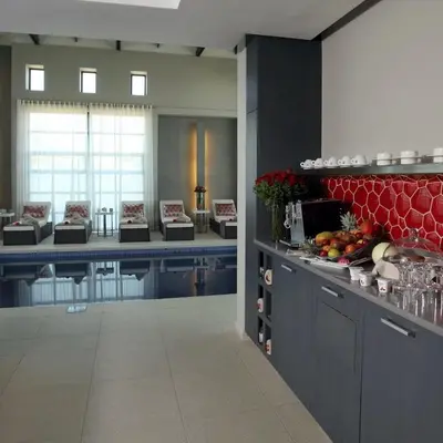 a large kitchen with a counter and a counter top at Links & Lavender in Centurion