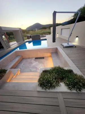 a backyard with a swimming pool and a deck at Euphoria 447 in Naboomspruit