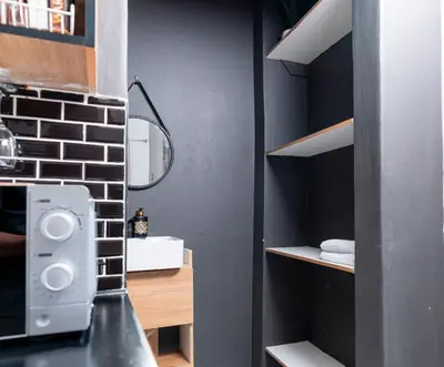 a bathroom with a sink and a mirror at Milan Coproperties in Kempton Park