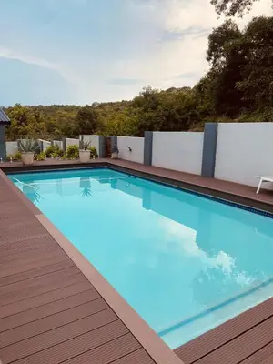 a swimming pool on the roof of a building at Alimu villa in Nelspruit