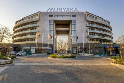 a large building with a sign on top of it at Staycation At Munyaka Estate in Midrand