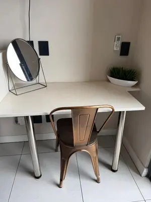 a desk with a chair and a mirror on it at Menlyn Maine Residences 811 in Pretoria