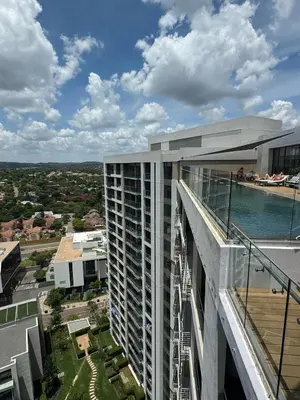 an elevated view of a building with a balcony at Menlyn Maine Residences 811 in Pretoria
