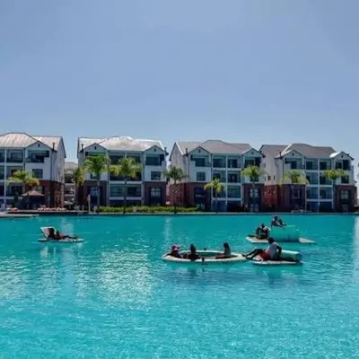 a group of people in boats in the water at The Blyde Crystal Lagoon in Pretoria
