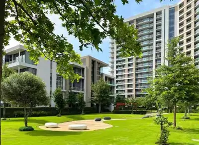 a park in front of a large building at Luxury King Studio, Menlyn Maine, Time Square Views, Smart Access in Pretoria