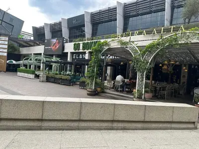 a building with an entrance with plants in front of it at Delarose business leisure Studio in Pretoria