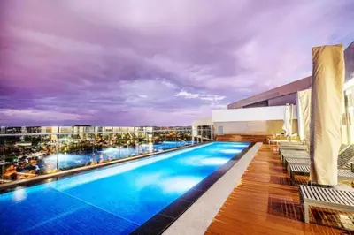 a large swimming pool on top of a building at Luxury 7th Floor Menlyn Maine Residences in Pretoria