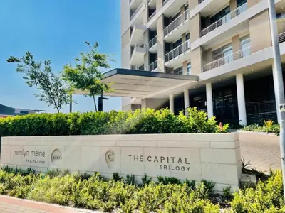 a sign in front of a building at Luxury 7th Floor Menlyn Maine Residences in Pretoria