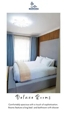 a bedroom with a king bed and a window at Marikana guest house