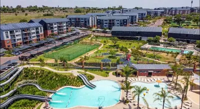 an aerial view of a resort with a swimming pool at Elegant escape in Midrand in Midrand