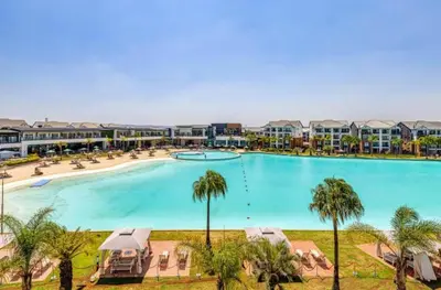 an image of a large swimming pool at a resort at The Blyde Crystal Lagoon Pretoria 3Bed in Pretoria