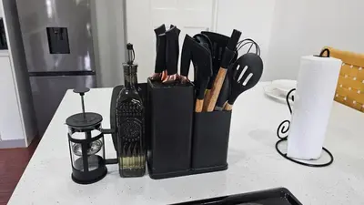 a knife block sitting on top of a counter with knives at Jacaranda Escape in Pretoria