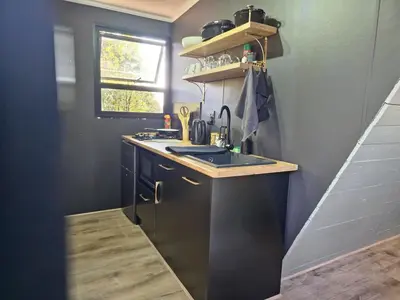 a small kitchen with a sink and a counter at Braai & Bubbles - Modimolle in Modimolle