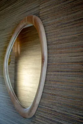 a wooden circle on top of a wooden table at Niemandsland in Hoedspruit