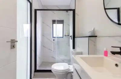 a bathroom with a shower and a toilet and a sink at Penflex in Midrand