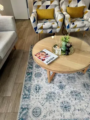 a living room with a coffee table and a couch at 2 beds, 2 bedrooms Family Suites 214 & 214-1 in Pretoria