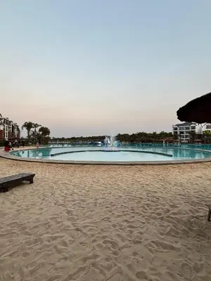a fountain in the middle of a sandy beach at Aqua Haven-The Blyde in Pretoria