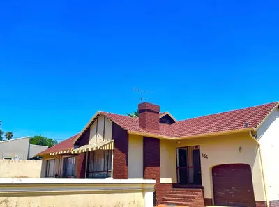a brick house with a red roof at Inconova fly in Kempton Park