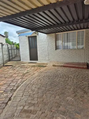 a patio of a house with awning at Sally's Place in Boksburg