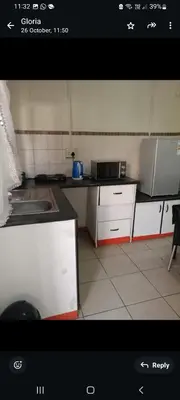 a kitchen with a sink and a counter top at Limelight in Polokwane