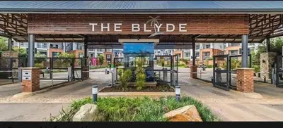 a bus stop with a sign that reads the bulgue at The Blyde Apartment in Pretoria