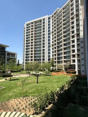 a large building with a park in front of it at 136 Trilogy in Pretoria