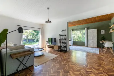 a living room with a couch and a table at Maroelana Home in Pretoria