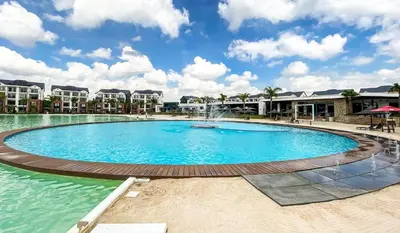 a large pool with a fountain in the middle at The Blyde Crystal Lagoon in Pretoria
