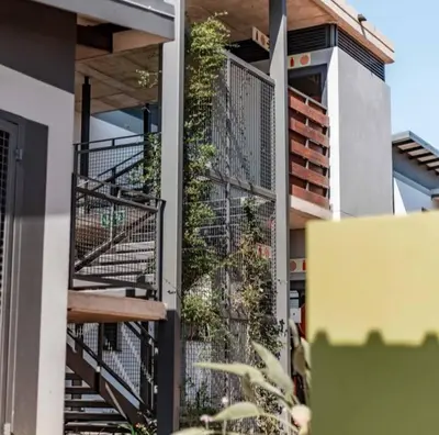 a building with a staircase with plants on it at The Eyrie in Nelspruit