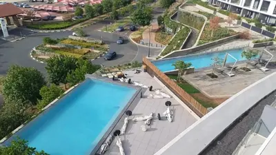 an overhead view of a swimming pool at a hotel at Ellipse Lux Hotel - Apartment in Midrand