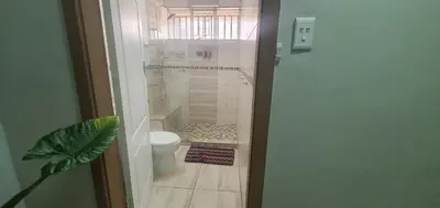 a small bathroom with a toilet and a shower at 329 on 30th Avenue Villieria Drian in Pretoria