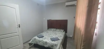 a small bedroom with a small bed in a room at 329 on 30th Avenue Villieria Justin in Pretoria