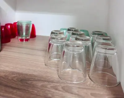 a group of glass jars sitting on top of a wooden table at The Blyde Riverwalk Estate - Luxury Escape in Pretoria