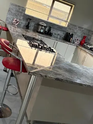a counter in a kitchen with a counter top at The Perazim Place at 222 Sabie River Eco-Estate in Hazyview