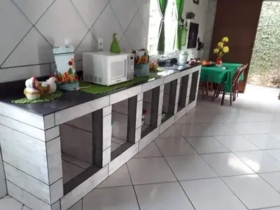 a kitchen with a counter with a microwave on it at Lakeboutiquehotel empire new in Thohoyandou