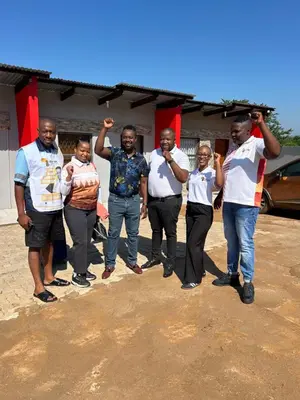a group of men are posing for a picture at Lakeboutiquehotel empire new in Thohoyandou