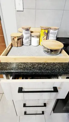 a counter top with bowls and pans on it in a kitchen at Felinga Guest House in Centurion