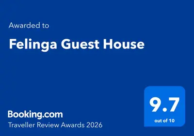 a blue sign with the text mailed to felika guest house at Felinga Guest House in Centurion