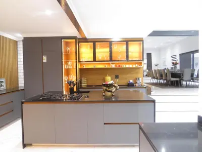 a kitchen with an island with a counter top at Thaba Bosiu Villa in Naboomspruit