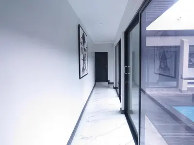 a hallway of a house with a swimming pool at Thaba Bosiu Villa in Naboomspruit