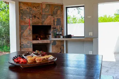 a tray of fruit on a table in a kitchen at Stripes & Sunsets Marloth Park - Self catering, Bush retreat With Pool & Wildlife views Near Kruger Park in Marloth Park